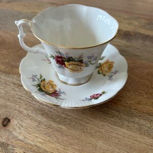Royal Albert White Teacup and Saucer with Yellow and Red Rose Motif